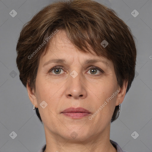 Joyful white adult female with short  brown hair and brown eyes