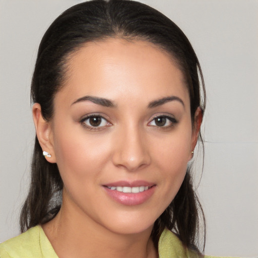 Joyful white young-adult female with medium  brown hair and brown eyes