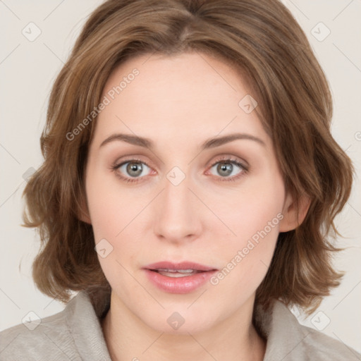 Joyful white young-adult female with medium  brown hair and green eyes