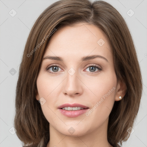 Joyful white young-adult female with medium  brown hair and green eyes