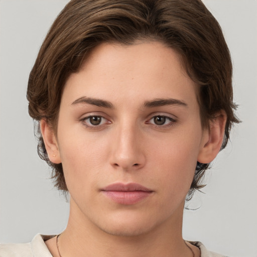 Neutral white young-adult female with short  brown hair and brown eyes