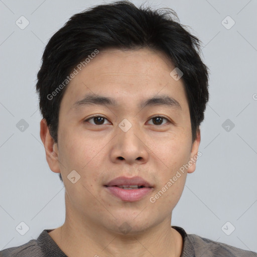 Neutral asian young-adult male with short  brown hair and brown eyes