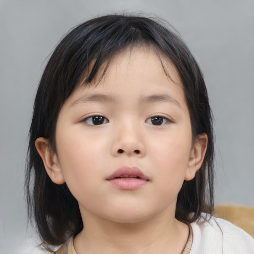 Neutral asian child female with medium  brown hair and brown eyes