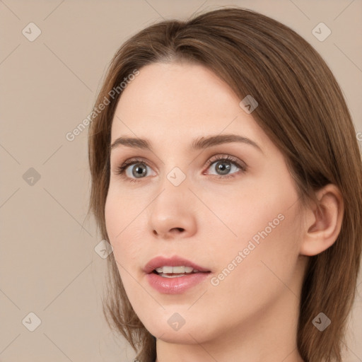 Neutral white young-adult female with long  brown hair and grey eyes