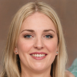 Joyful white adult female with long  brown hair and brown eyes