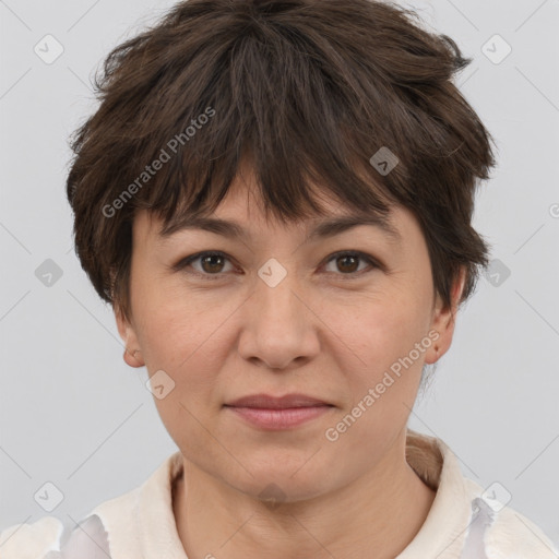 Joyful white adult female with short  brown hair and brown eyes