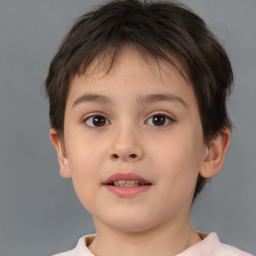 Joyful white child female with short  brown hair and brown eyes