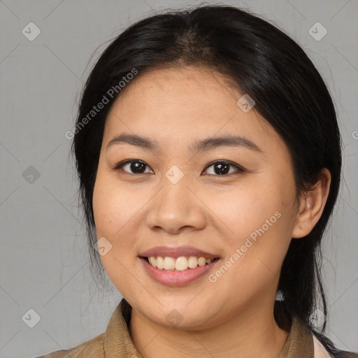 Joyful asian young-adult female with medium  brown hair and brown eyes