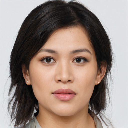 Neutral asian young-adult female with medium  brown hair and brown eyes