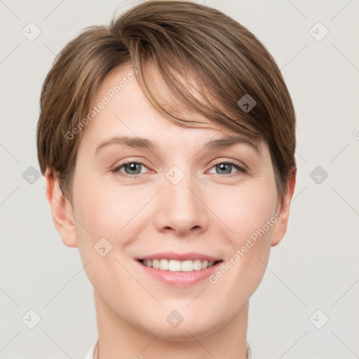 Joyful white young-adult female with short  brown hair and grey eyes