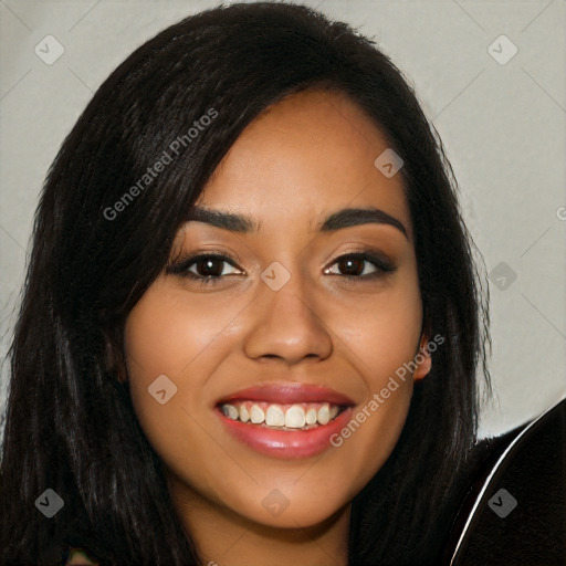 Joyful latino young-adult female with long  black hair and brown eyes