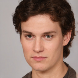 Neutral white young-adult male with medium  brown hair and brown eyes