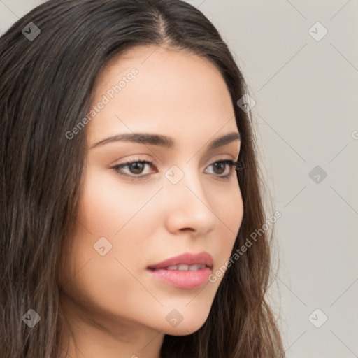 Neutral white young-adult female with long  brown hair and brown eyes