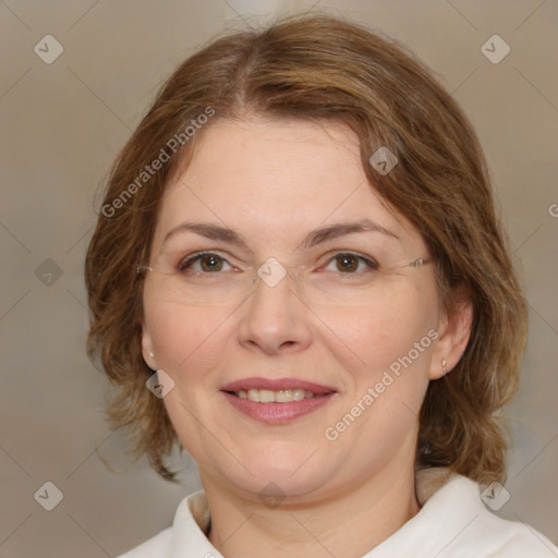 Joyful white adult female with medium  brown hair and green eyes