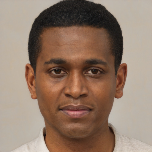 Neutral black young-adult male with short  black hair and brown eyes