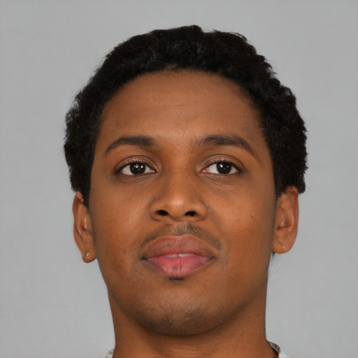 Neutral black young-adult male with short  brown hair and brown eyes