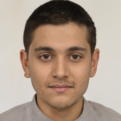 Neutral latino young-adult male with short  brown hair and brown eyes
