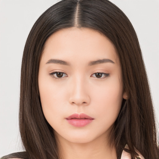 Neutral asian young-adult female with long  brown hair and brown eyes