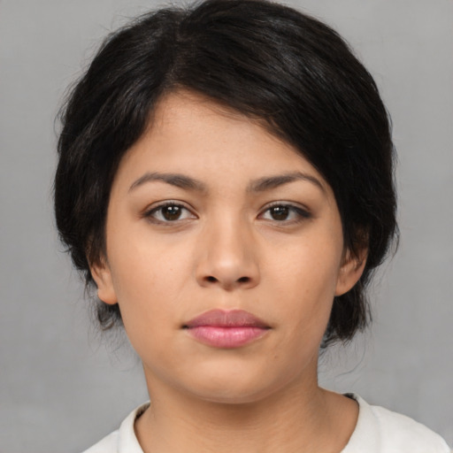 Neutral asian young-adult female with medium  black hair and brown eyes