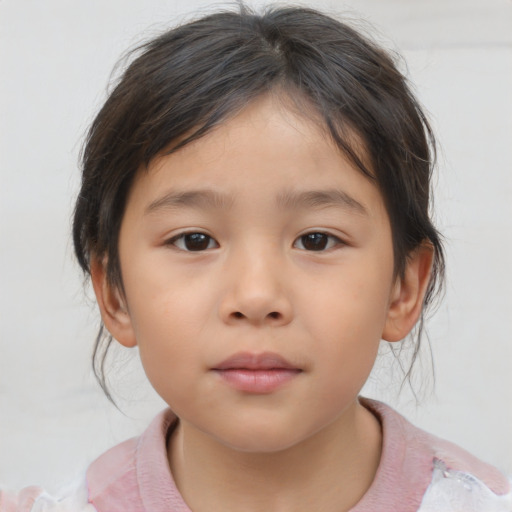 Neutral asian child female with medium  brown hair and brown eyes