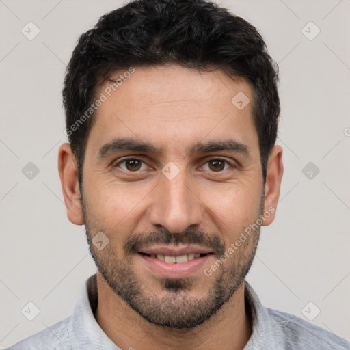 Joyful white young-adult male with short  black hair and brown eyes