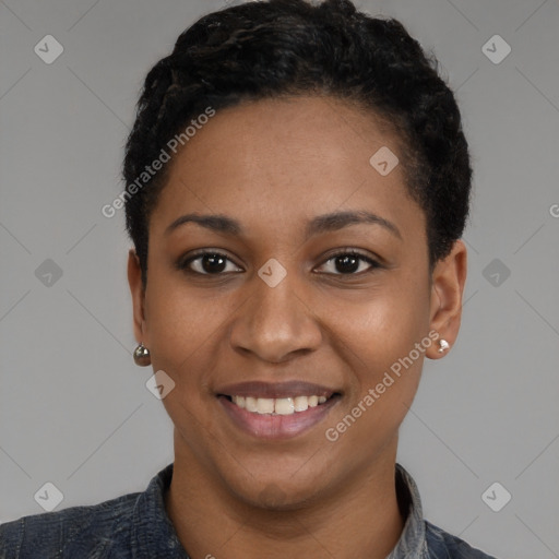 Joyful black young-adult female with short  black hair and brown eyes