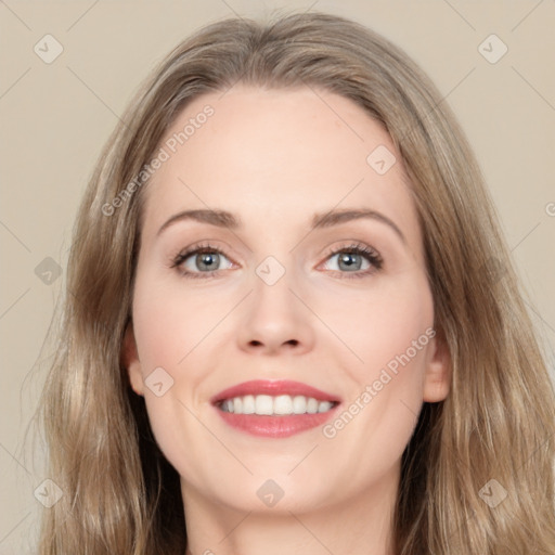 Joyful white young-adult female with long  brown hair and grey eyes