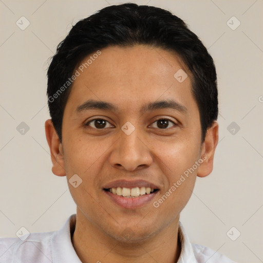 Joyful latino young-adult male with short  black hair and brown eyes