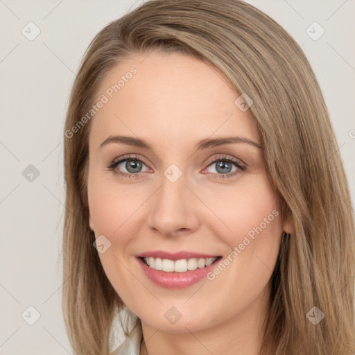 Joyful white young-adult female with long  brown hair and green eyes