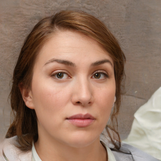 Neutral white young-adult female with medium  brown hair and brown eyes