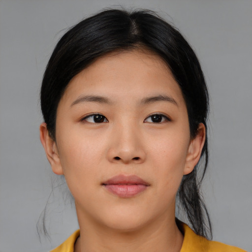 Neutral asian young-adult female with medium  brown hair and brown eyes