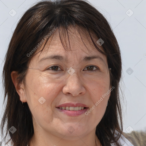 Joyful white adult female with medium  brown hair and brown eyes