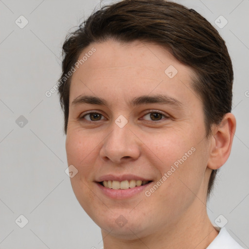 Joyful white young-adult female with short  brown hair and brown eyes