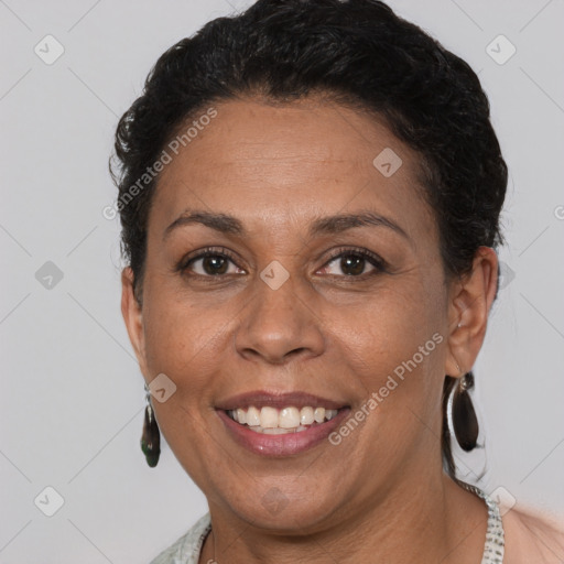 Joyful white adult female with short  brown hair and brown eyes