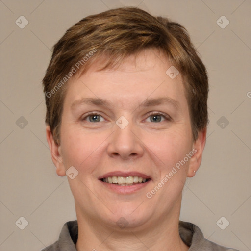 Joyful white adult male with short  brown hair and grey eyes