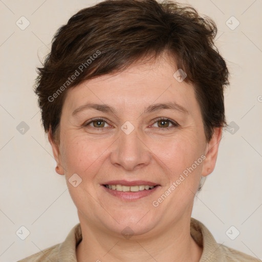 Joyful white adult female with short  brown hair and brown eyes