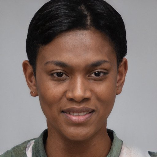 Joyful latino young-adult female with short  black hair and brown eyes