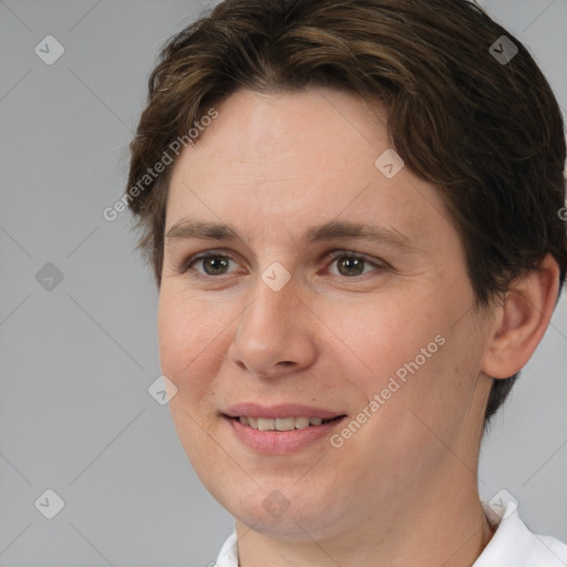 Joyful white adult female with short  brown hair and brown eyes