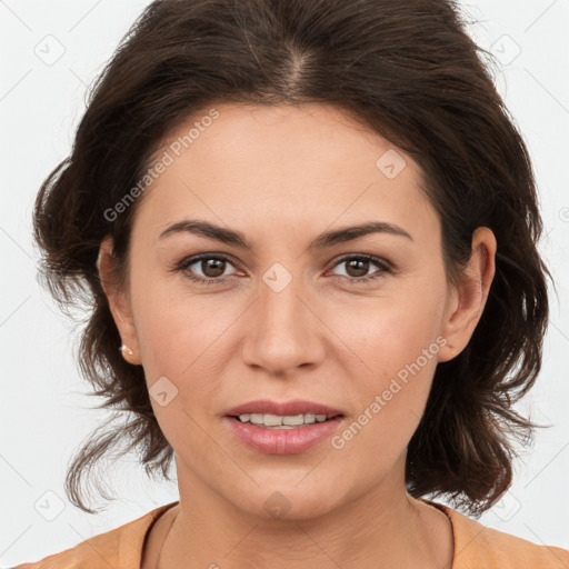 Joyful white young-adult female with medium  brown hair and brown eyes