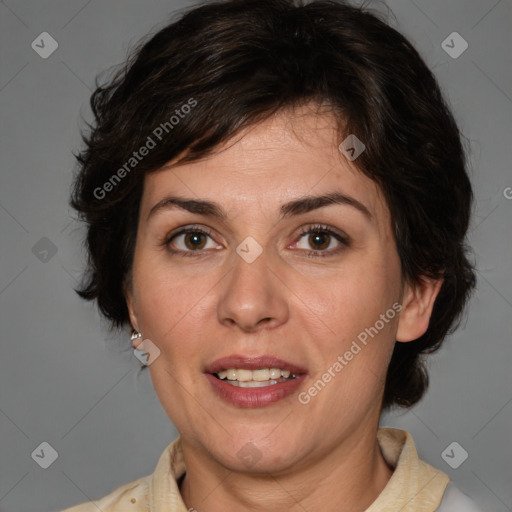 Joyful white adult female with medium  brown hair and brown eyes