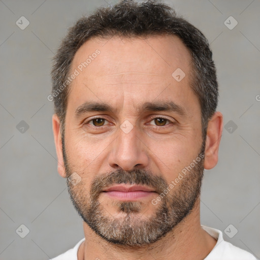 Neutral white adult male with short  brown hair and brown eyes