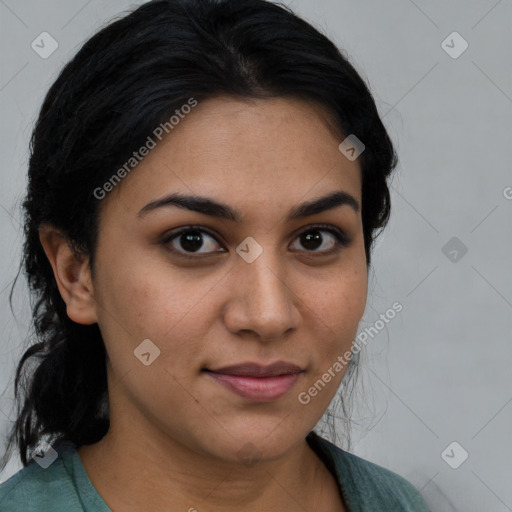 Joyful latino young-adult female with medium  brown hair and brown eyes