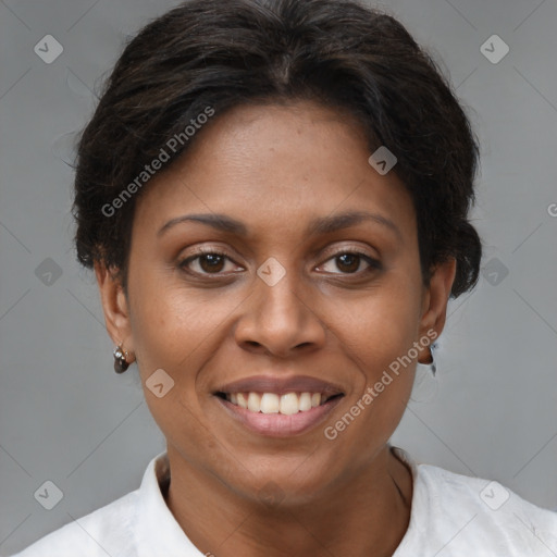 Joyful black young-adult female with short  brown hair and brown eyes