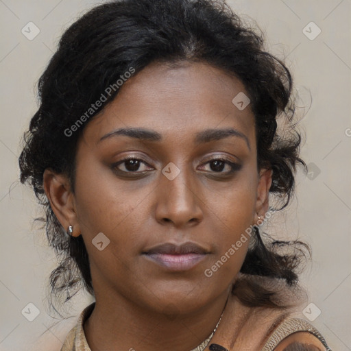 Neutral black young-adult female with medium  brown hair and brown eyes