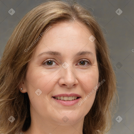 Joyful white adult female with medium  brown hair and brown eyes