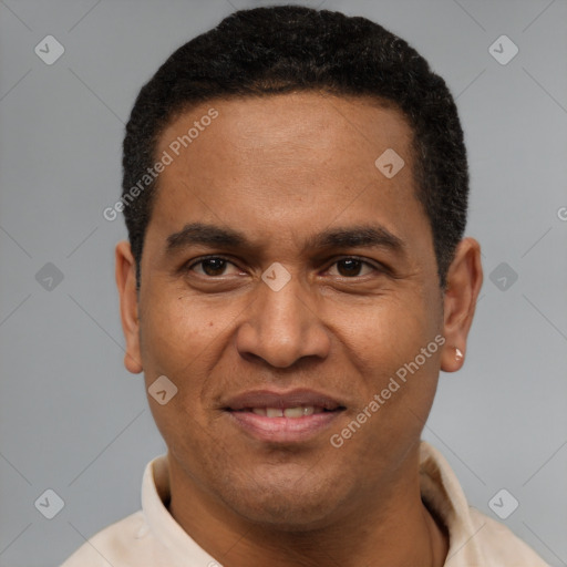 Joyful latino young-adult male with short  brown hair and brown eyes