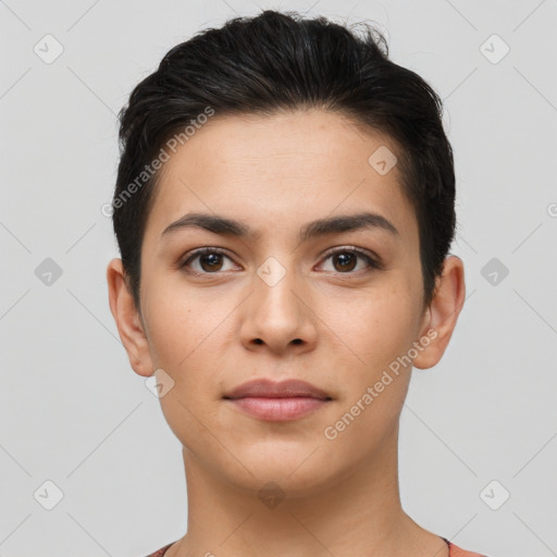 Joyful latino young-adult female with short  brown hair and brown eyes