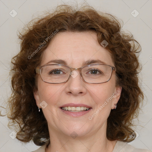 Joyful white adult female with medium  brown hair and blue eyes