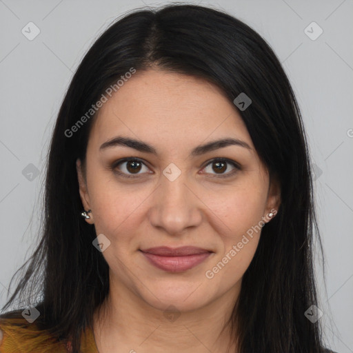 Joyful latino young-adult female with long  brown hair and brown eyes