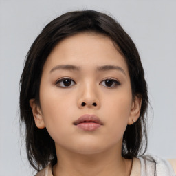 Neutral asian young-adult female with medium  brown hair and brown eyes